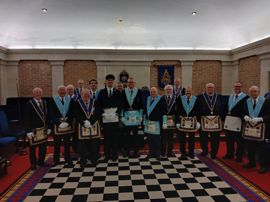 Winchester Freemasons of Old Symondian Lodge in regalia, group photograph in the lodge room
